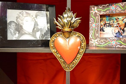 Votive gifts and pictures at the Ofrendas for the deceased
